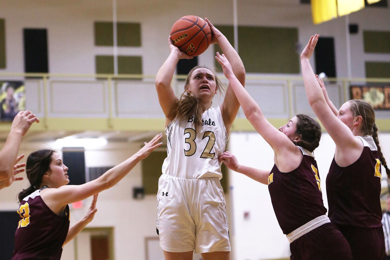 McKinly Hepp looks for two despite several nearby defenders